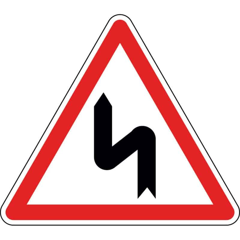 Panneau succession de virages dont le premier est à gauche - A1d